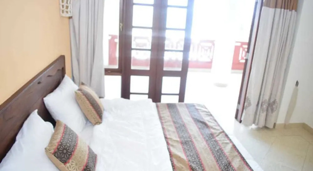 Семейные апартаменты с 2 комнатами рядом с пляжем Blissful Beach Apartment