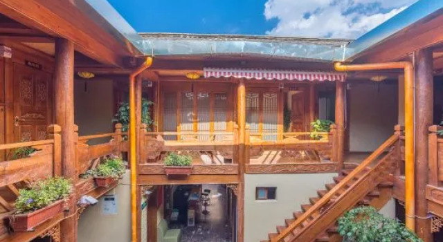 Lijiang Nanyang Humanistic Exquisite Courtyard Inn, Забронировать Отель Отели Лицзян с парковкой, рядом с Улица Сквер-стрит Древнего города Даянь, Парковка