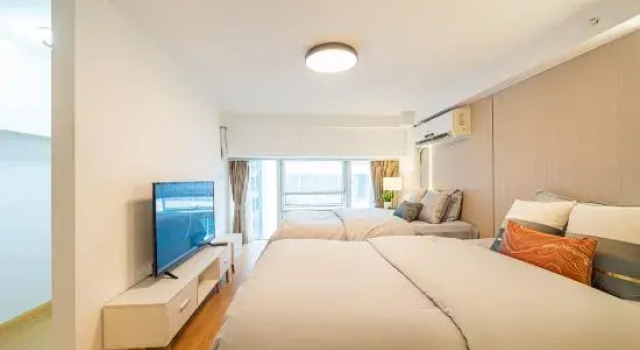 Кровать в общем номере Дуплекс с 3 комнатами Huazhishe Apartment (Hongqiao National Convention and Exhibition Center Branch)