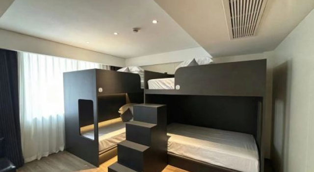 Кровать в общем номере Huadigang Yueting Concept Hotel