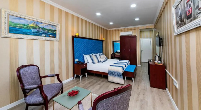 Luksusowy dwuosobowy pokój Dove Marlon Hotel