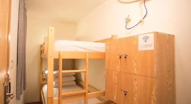 Кровать в общем номере Xian Travelling With Hostel Zhu Que Men