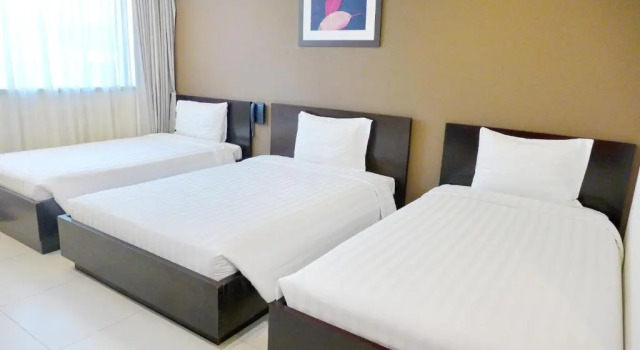 Трёхместный номер Deluxe Minh Khang Hotel