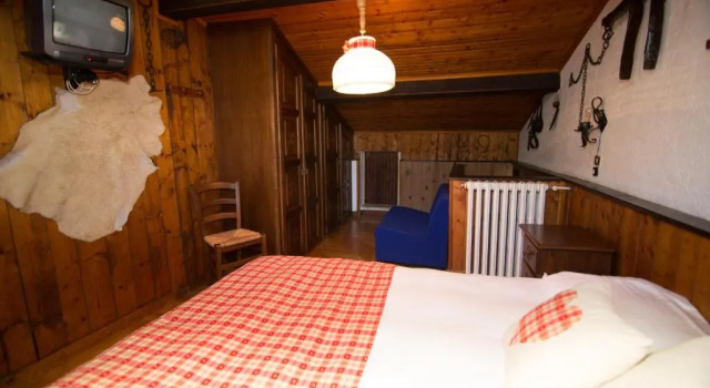 Camera quadrupla Standard con vista sul giardino Hotel Edelweiss