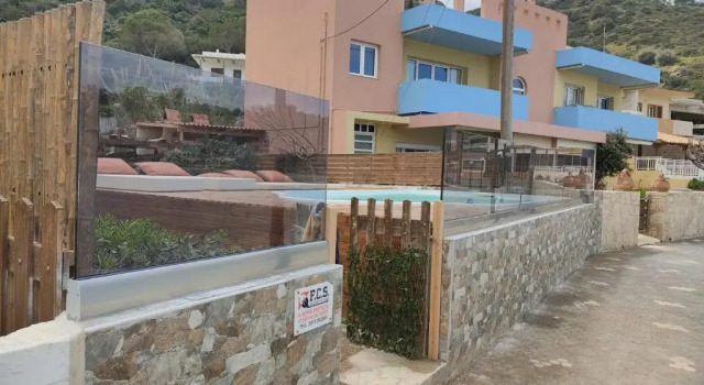Коттедж Beach front apartment with swimming pool