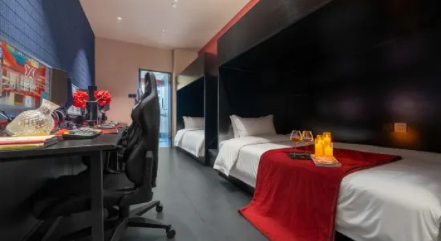 Кровать в общем номере Xiangyu·ANCORA E-sports Art Hotel (Fuyang Shuangqing Bay Park Shuijie Branch)
