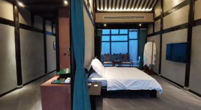 Люкс Мансарда Emeishan Liangchu Tiansi Tang Homestay