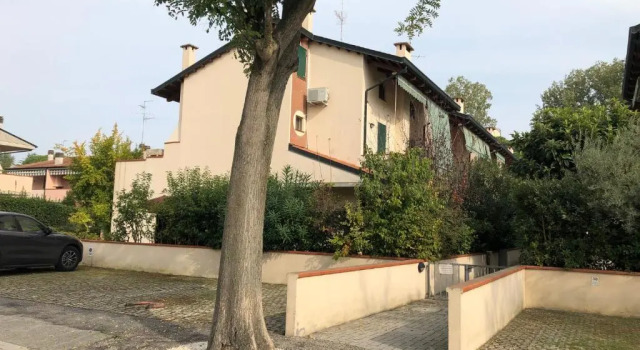 Апартаменты Appartamento curato con giardino