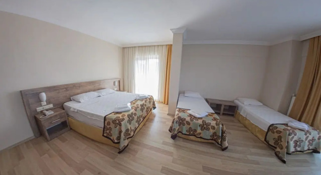 Четырёхместный номер Standard Turkuaz Beach Hotel