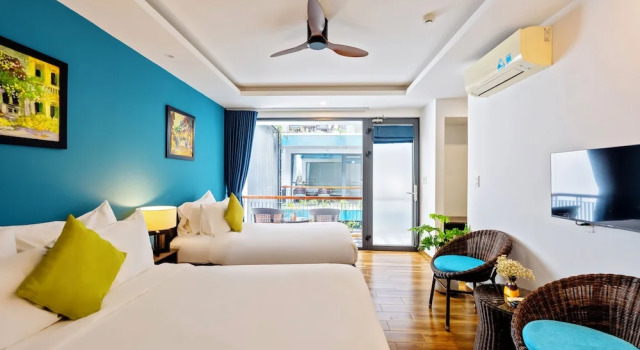 Трёхместный номер Deluxe с балконом и с видом на бассейн The Nam An Villa Hoi An