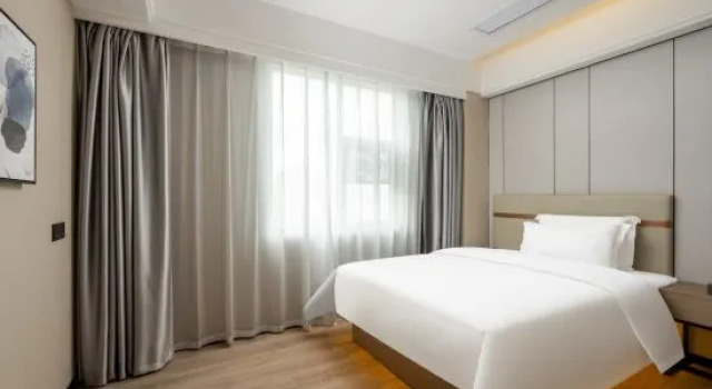 Двухместный люкс Executive с 2 комнатами Weilianmeiji Hotel (Daling Mountain Branch, Dongguan)