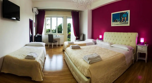 Standard quadruple chambre Metropolis B&B