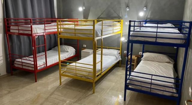 Кровать в общем номере Lion University & Youth Hostel Milano