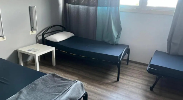 Кровать в общем номере Albergue Alfonso II