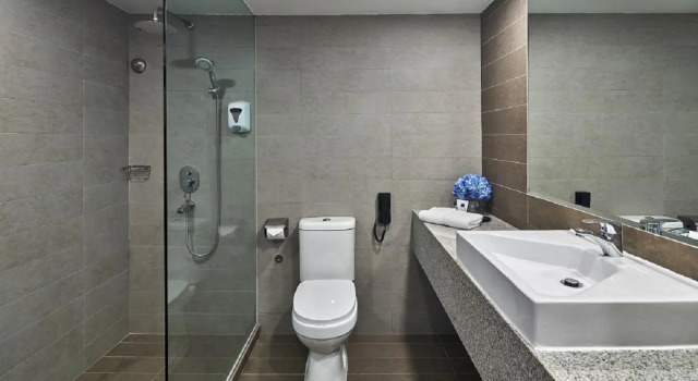 Четырёхместный номер Executive RELC International Hotel