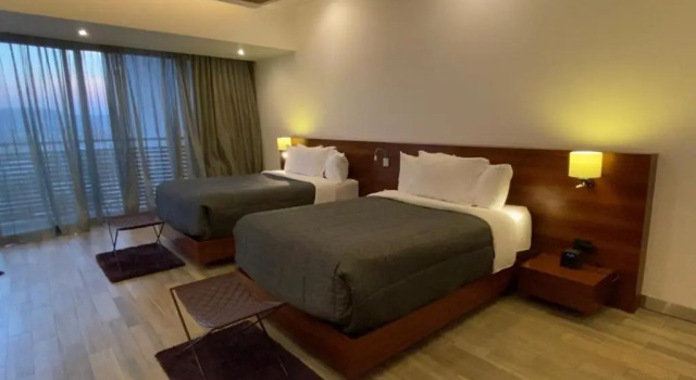 Четырёхместный номер Standard Sonata Hotel Puebla Angelópolis Distrito Sonata