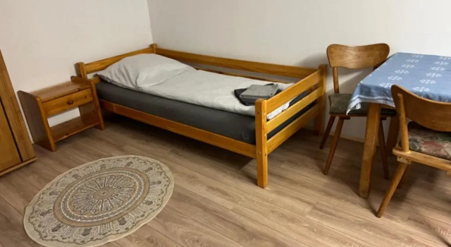 Кровать в общем номере Hotel Hirsch Fluorn Schwarzwald