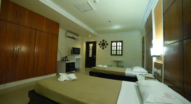 Трёхместный номер Deluxe с 2 комнатами Marcian Business Hotel