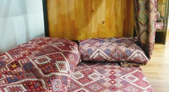 Кровать в общем номере Doi Thong Homestay