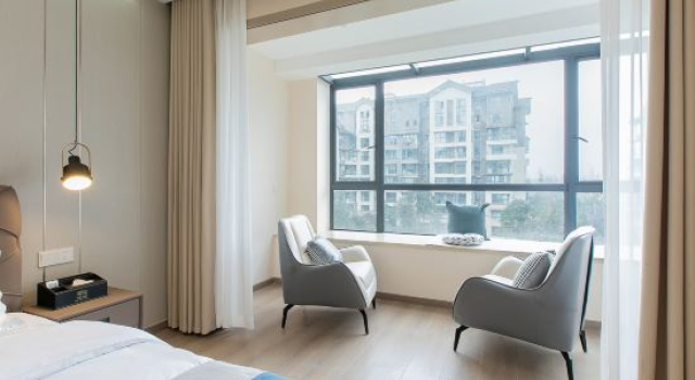 Семейный люкс с 3 комнатами Yunfengjian Anlan Shangpin Hotel (Dujiangyan Sunac Cultural Tourism City)