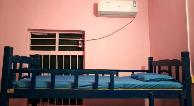 Кровать в общем номере Wan Ning Xiao Gang Guest House