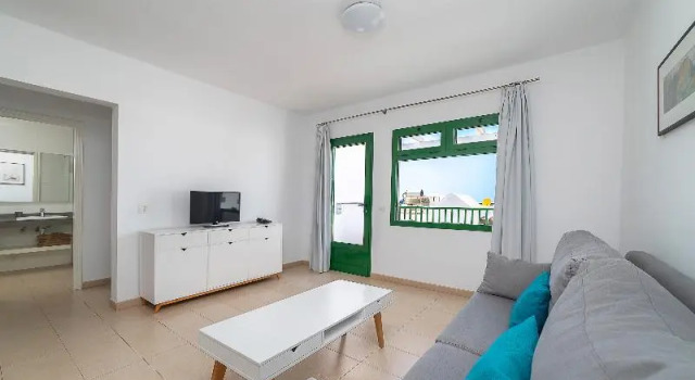 Четырёхместные апартаменты с 2 комнатами с балконом Apartamentos Elena