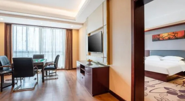 Люкс Deluxe Savile Hengsheng International Hotel