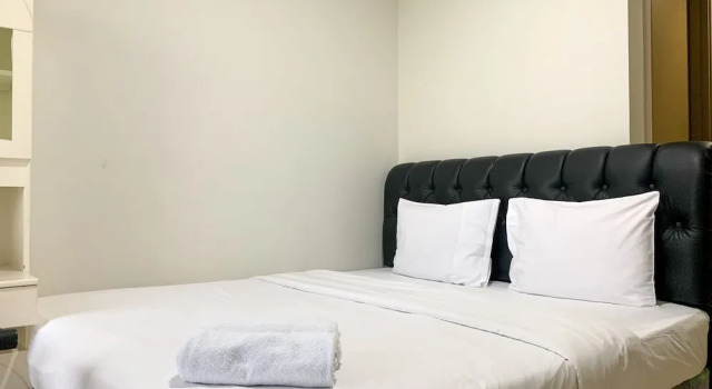 Апартаменты Minimalist And High Floor Studio Room At Gold Coast Apartment