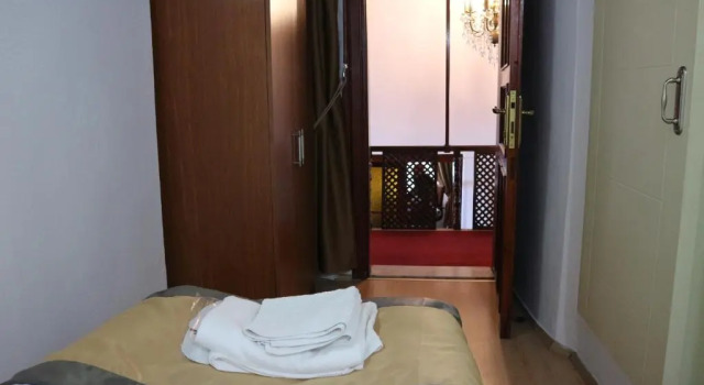 Кровать в общем номере Konak Hotel Kaleiçi