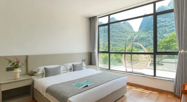 Люкс с 2 комнатами Yueshanyueshui Vacation Apartment (Yangshuo Yulong River Xiatang Wharf)