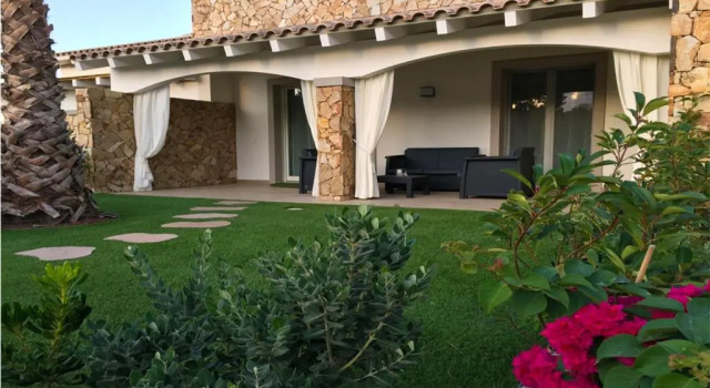 Апартаменты с видом на сад RESIDENCE ELEGANCE ville ed appartamenti a Porto Pino