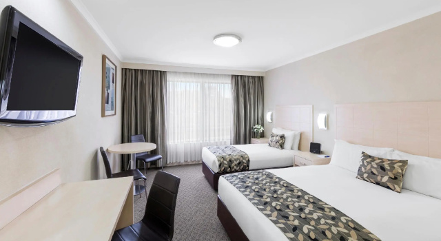 Трёхместный номер Deluxe Garden City Hotel, Best Western Signature Collection