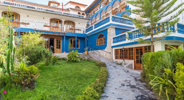 Кровать в общем номере Selina Huaraz