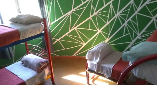Кровать в общем номере Hostel Joven Casa Reggae