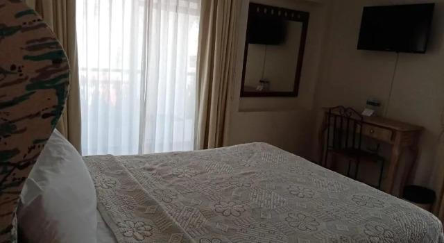 Четырёхместный номер Standard с балконом и с красивым видом из окна Hotel Real de San Diego