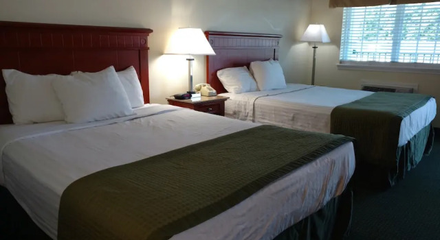 Deluxe Vierer Zimmer mit Balkon Hurricane Inn