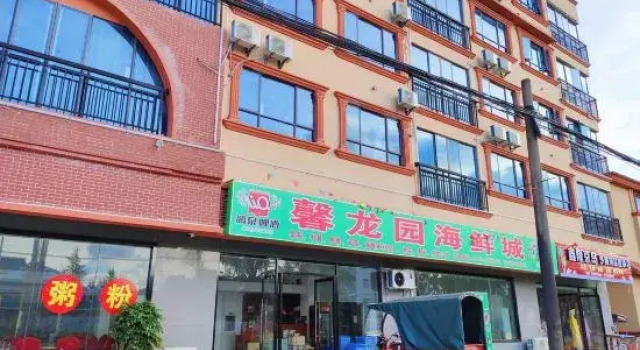 Dongxing Xinlongyuan Hotel, Buchen Sie Hotel Hotels in Guangxi mit Parkplatz, Parkplätze