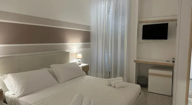 Четырёхместный номер Standard с балконом Hotiday Porto Cesareo