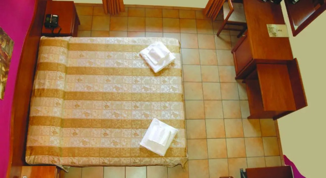 Четырёхместный номер Standard Дуплекс Hotel Duca Della Corgna