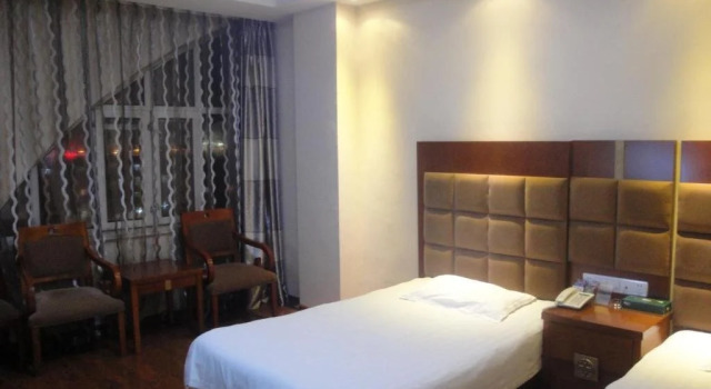 Mudanjiang Wan Zai Business Hotel, Prenota Hotel Mudanjiang Heilongjiang
