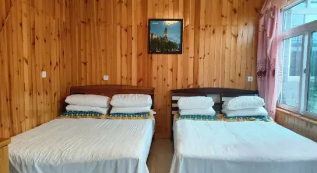 Кровать в общем номере Beijing Lianhuachi DuJinhua Country Inn Hotel
