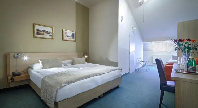 Camera tripla Economy mansarda Hotel Taurus