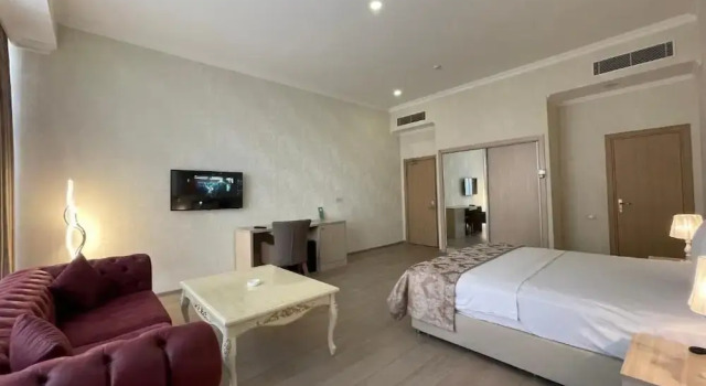Номер Deluxe Ammar Grand Hotel