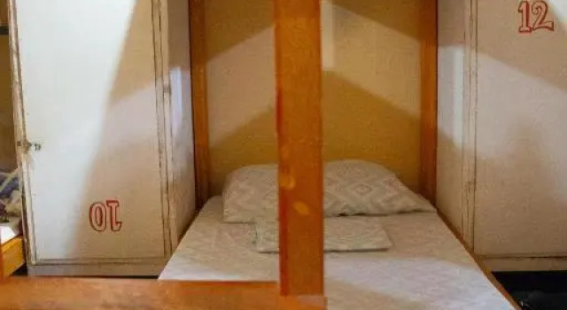 Кровать в общем номере Malayah Hostel