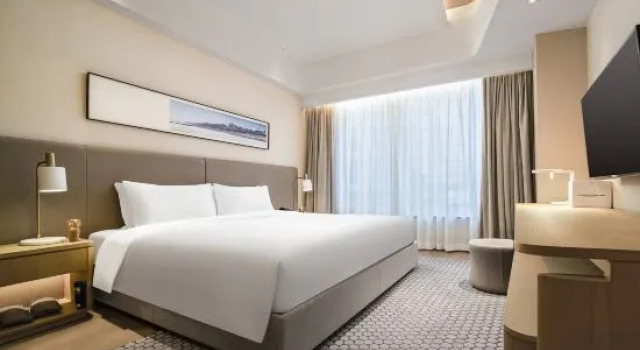 Люкс Deluxe с 3 комнатами Primcasa Suites Hotel Financial City Chengdu