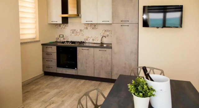 Коттедж c 1 комнатой Capo dOrlando Apartments - Doria 52