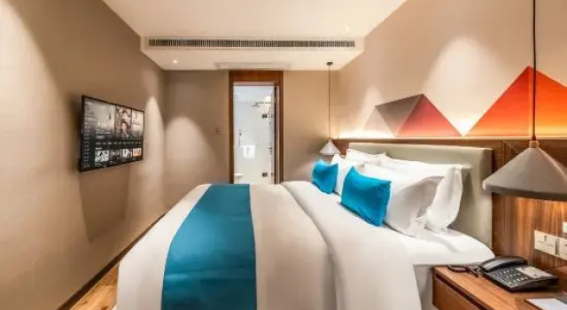 Люкс Qujing Ouduo Hotel (Qilin District South City Store)