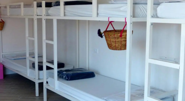 Кровать в общем номере Meet Gardalake Hostel