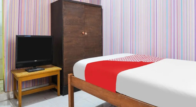 Номер Economy Hotel O Christine Home Stay Syariah