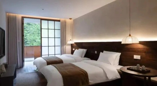 Кровать в общем номере Shanyin Yishu Boutique B&B